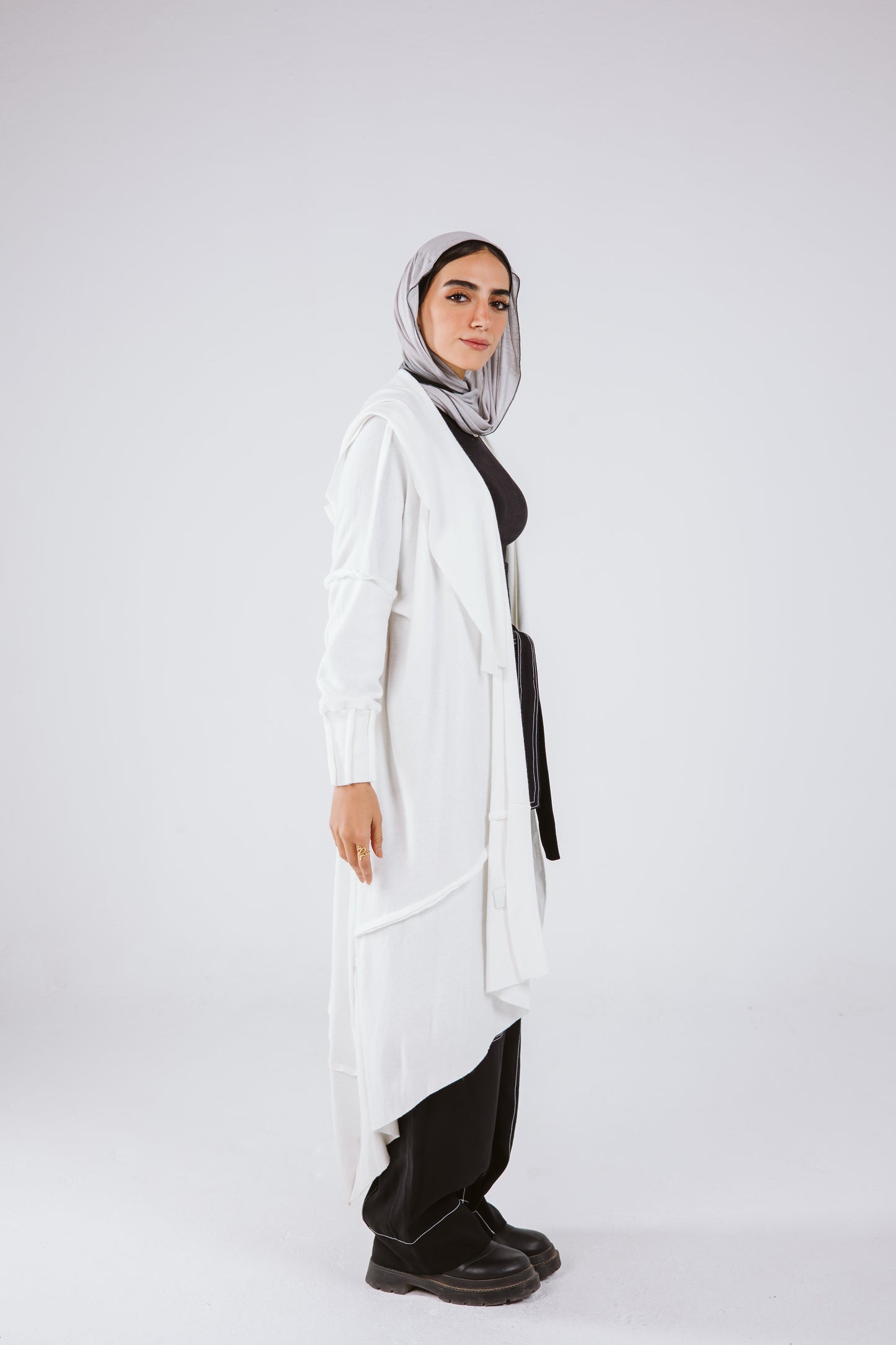 Asymmetrical Stitches Wool Cardigan in White.