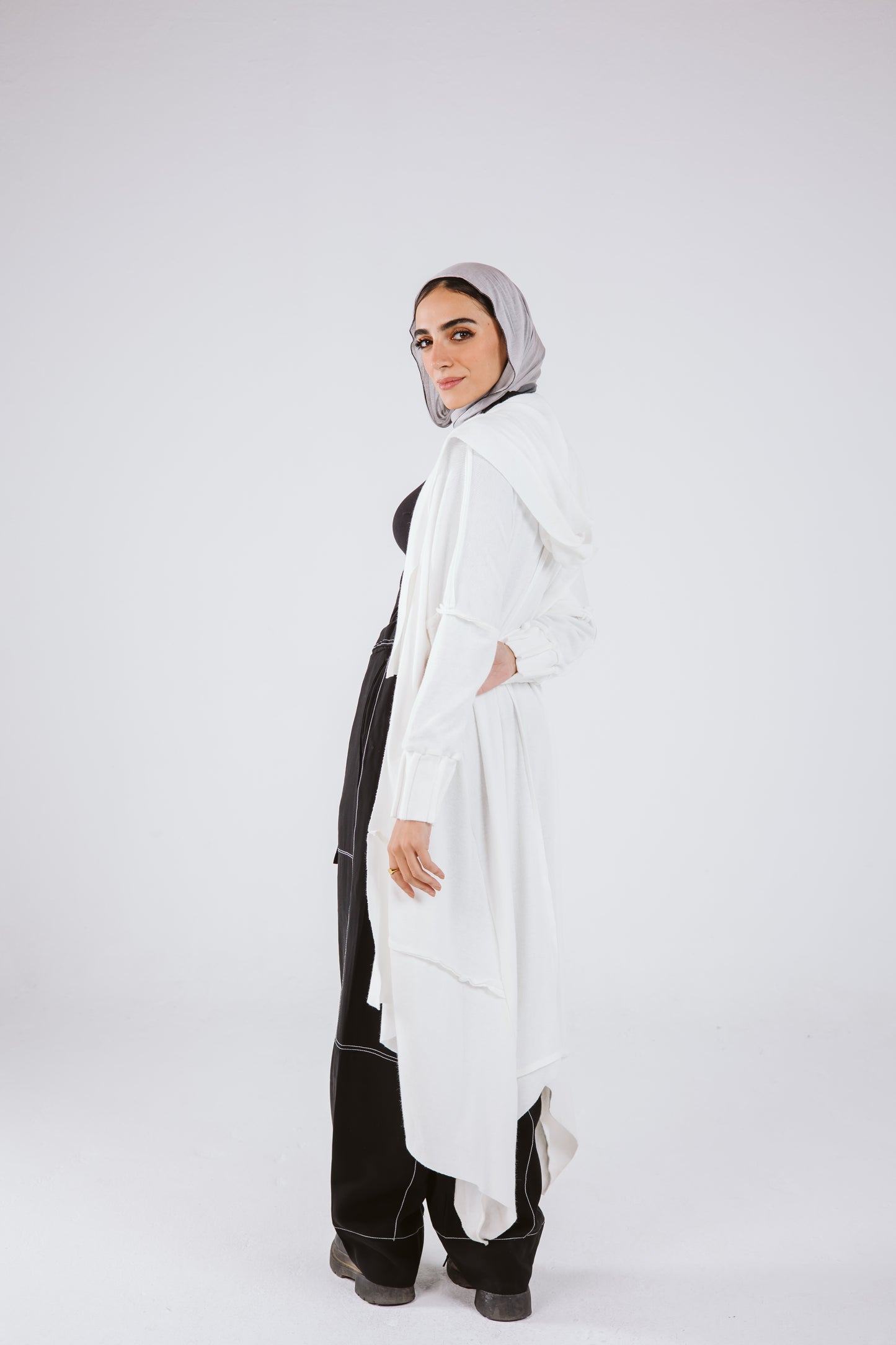 Asymmetrical Stitches Wool Cardigan in White.