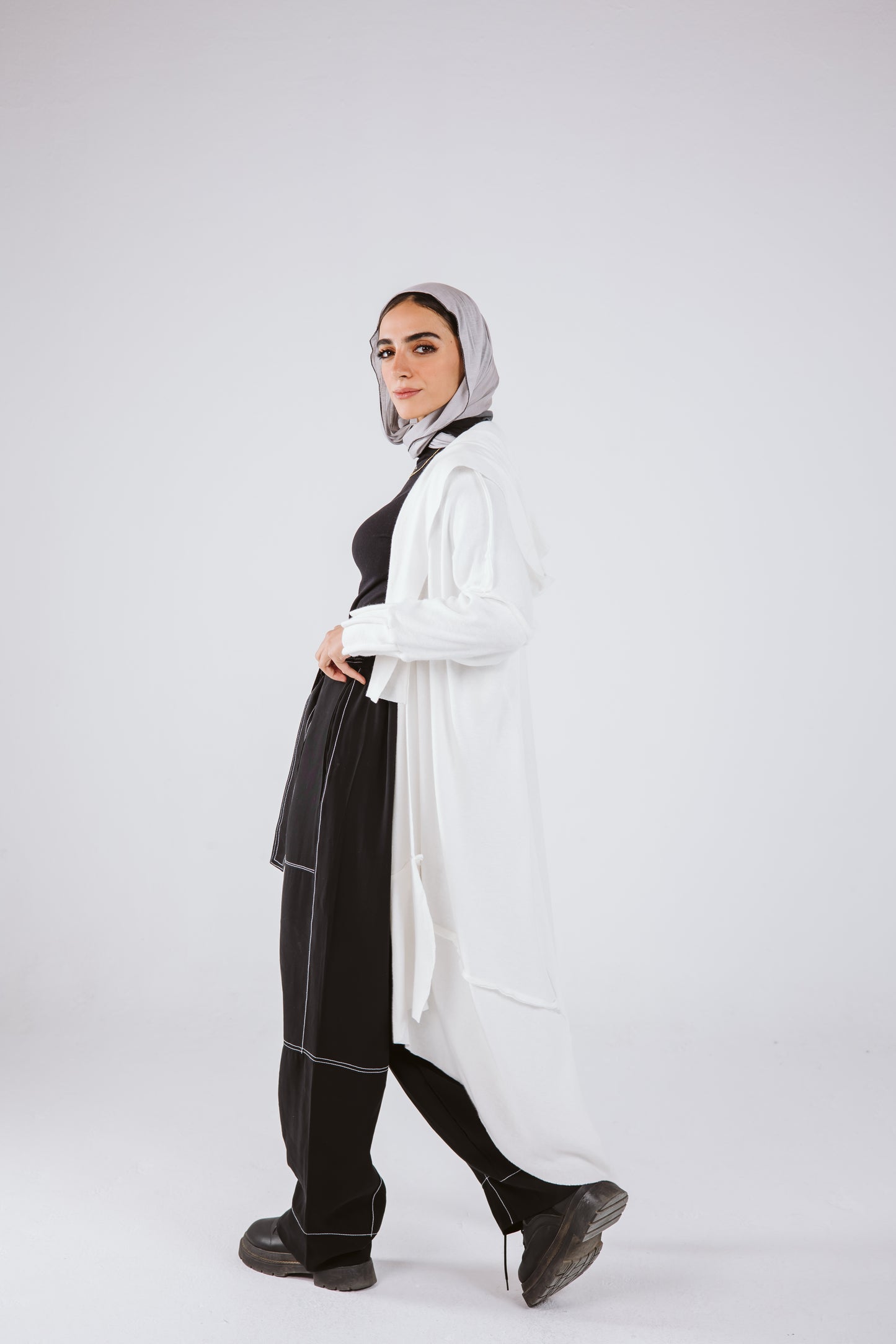 Asymmetrical Stitches Wool Cardigan in White.