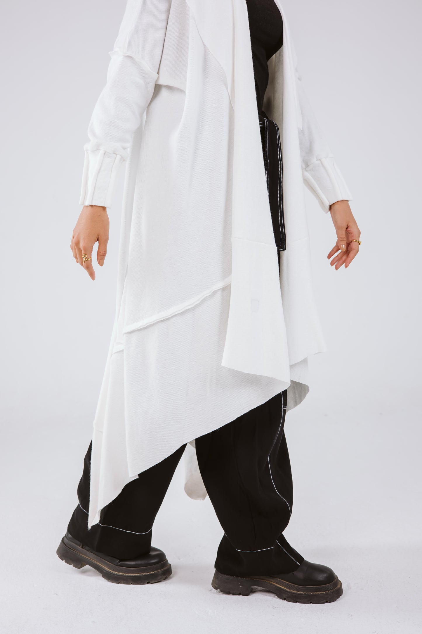Asymmetrical Stitches Wool Cardigan in White.