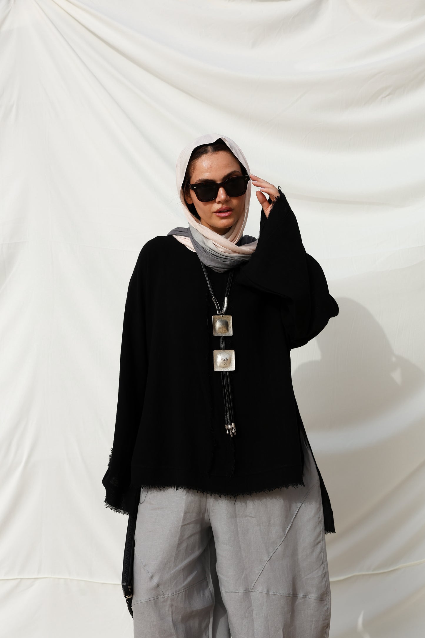 The Unfinished Bell Sleeves Linen Top in Black