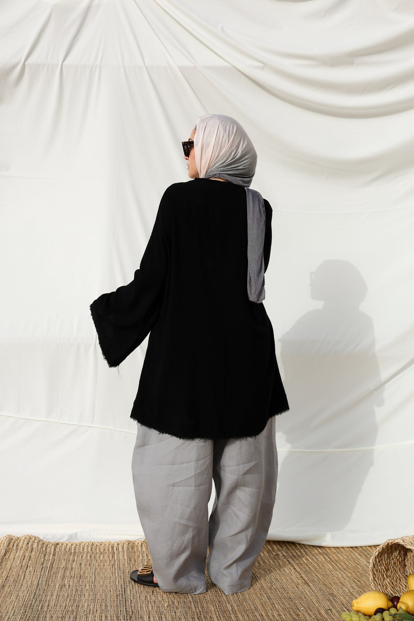 The Unfinished Bell Sleeves Linen Top in Black