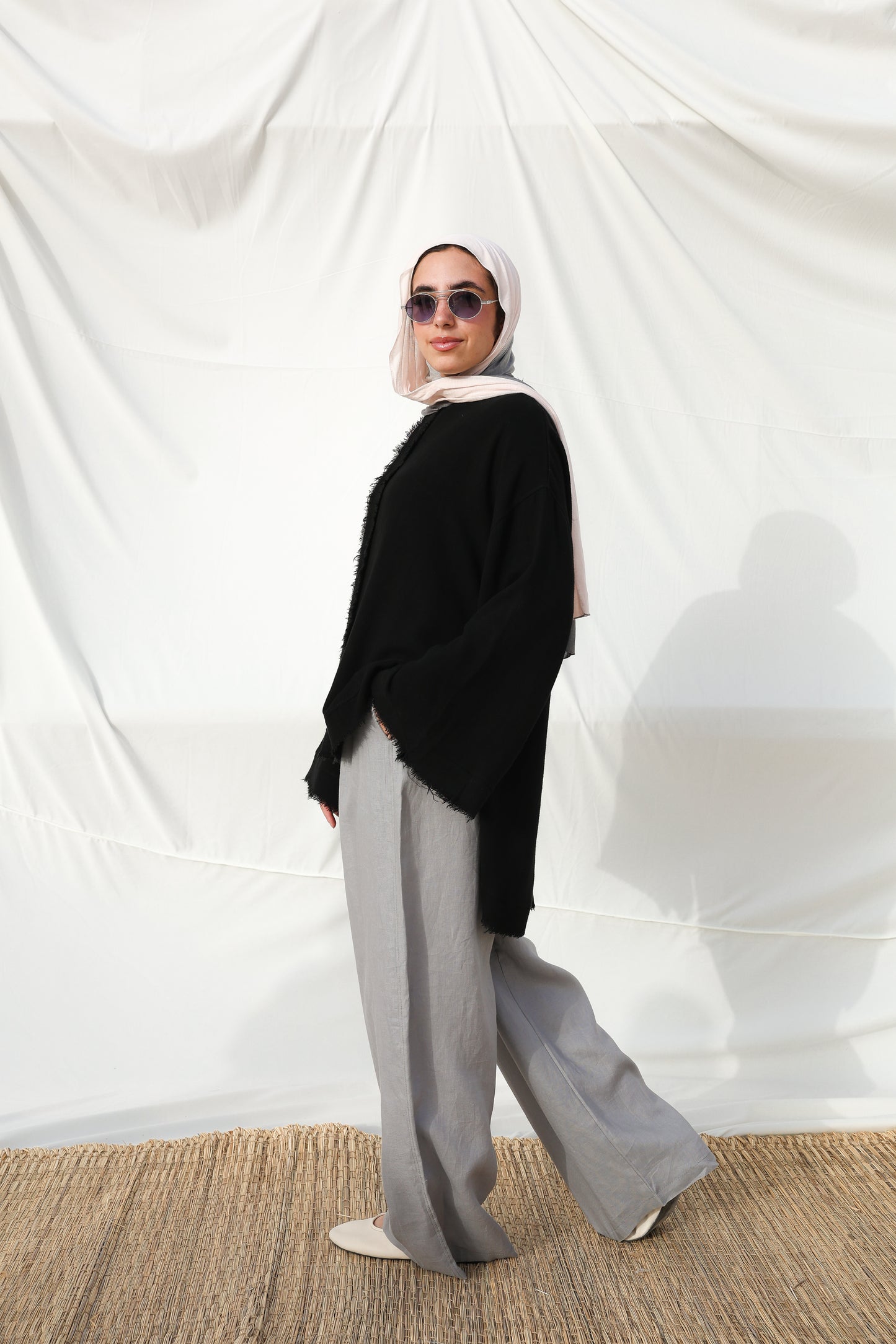 The Unfinished Bell Sleeves Linen Top in Black