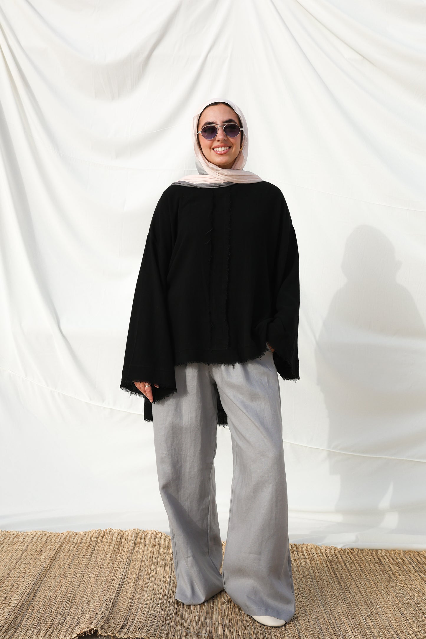 The Unfinished Bell Sleeves Linen Top in Black