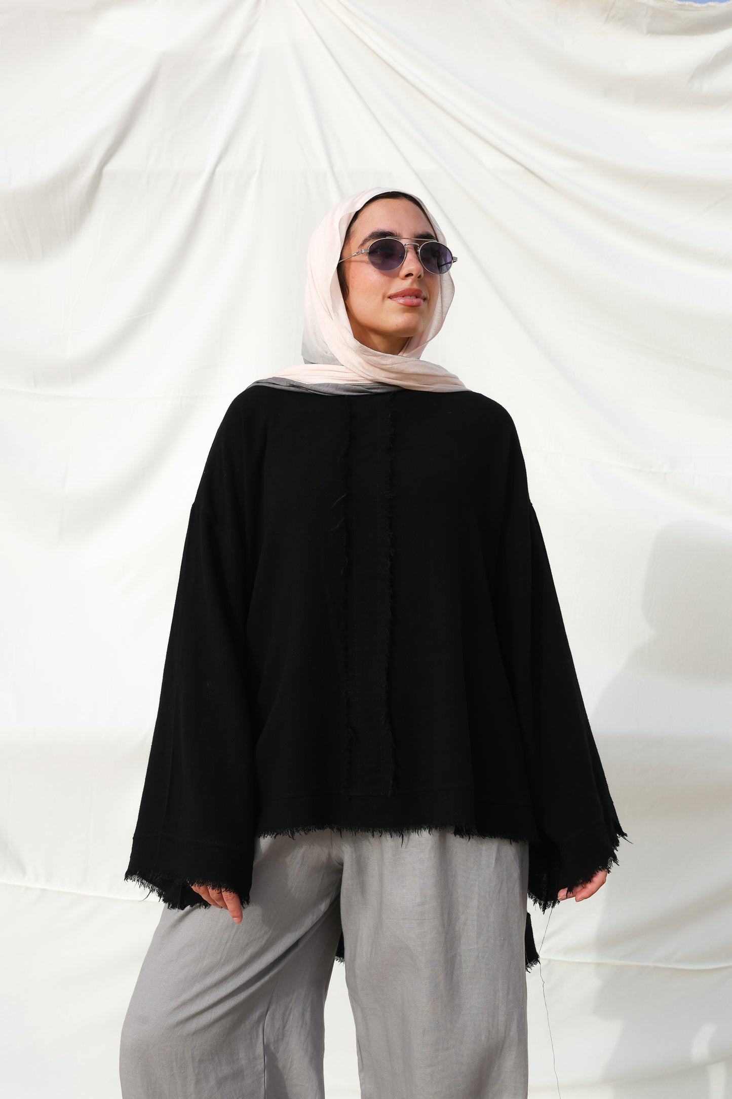 The Unfinished Bell Sleeves Linen Top in Black