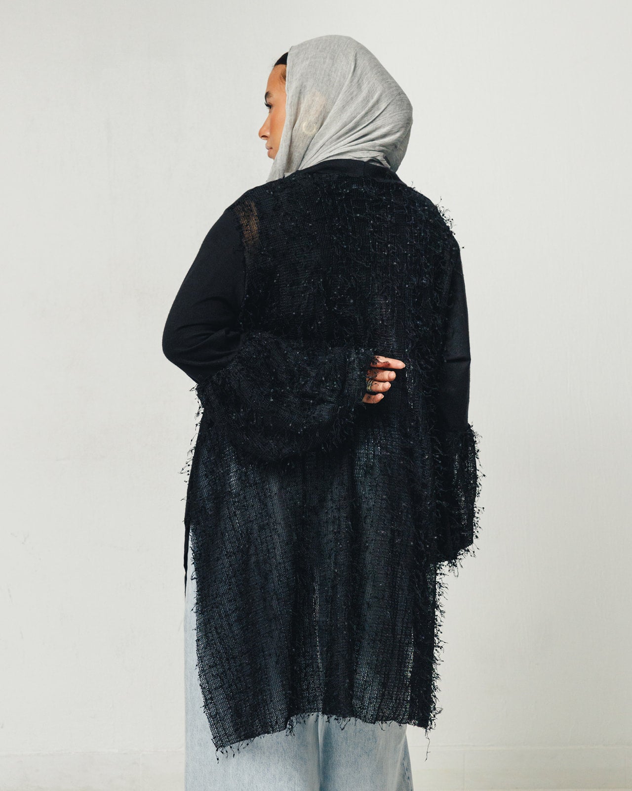 Feathers Knit Puffy Sleeves High Low Top