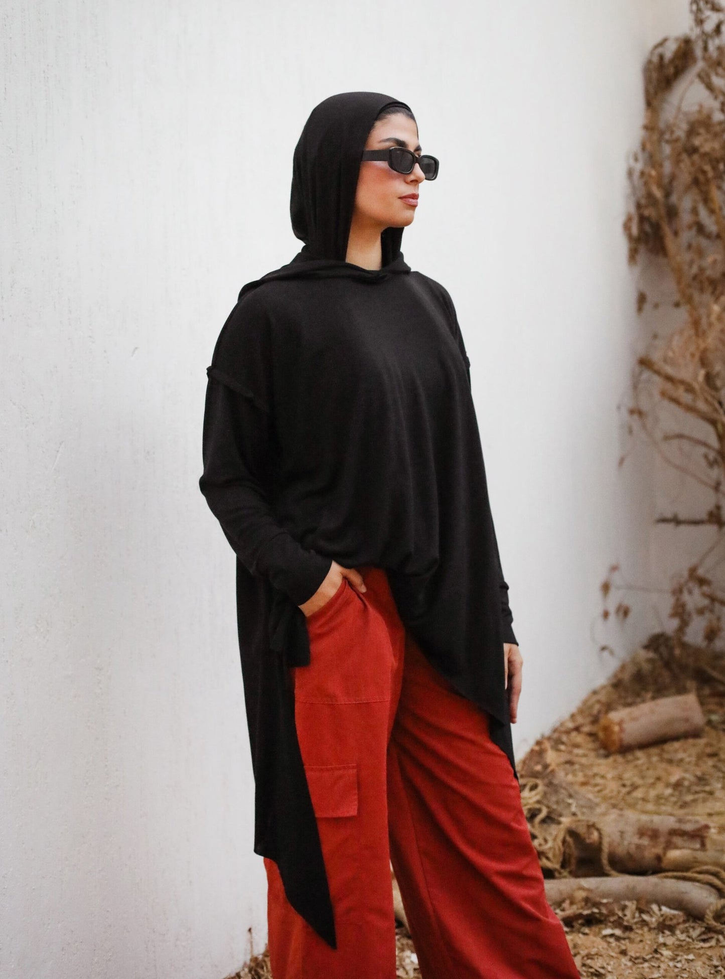 Asymmetrical hoodie top in Black