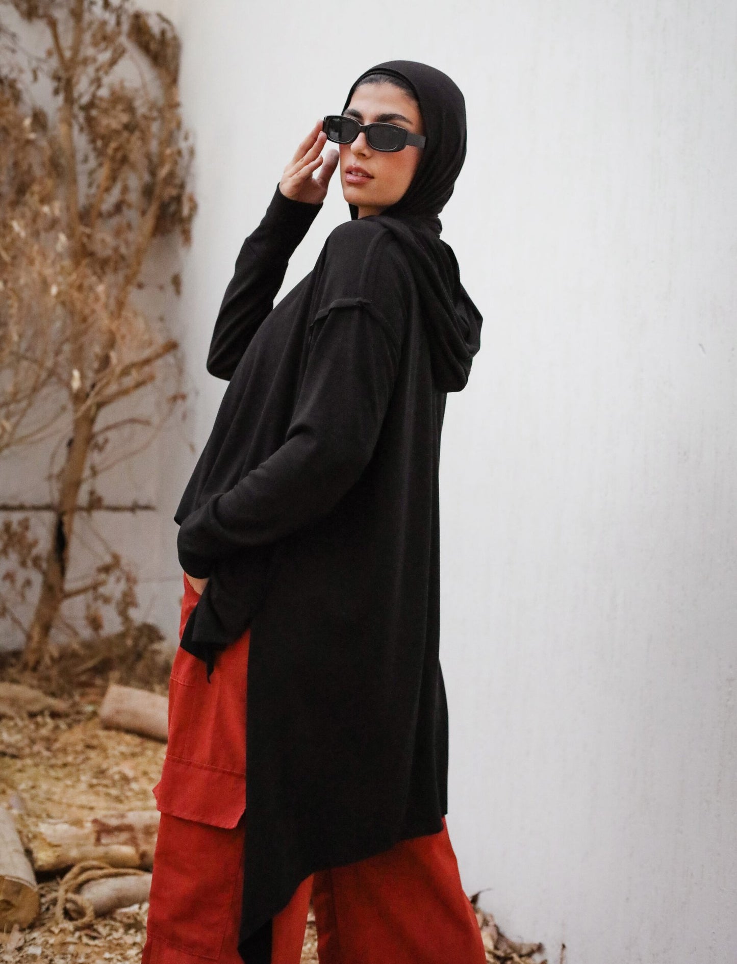 Asymmetrical hoodie top in Black