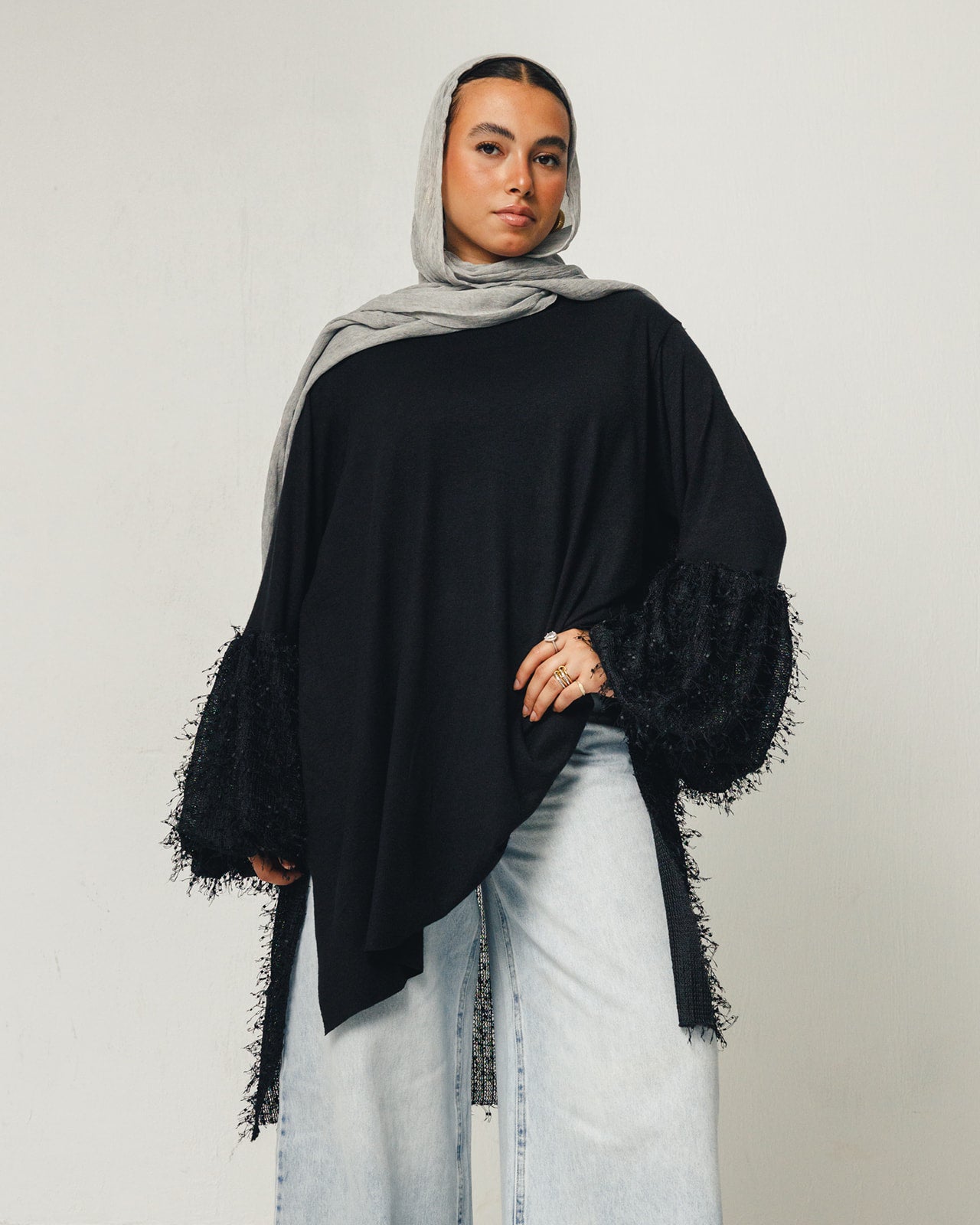 Feathers Knit Puffy Sleeves High Low Top