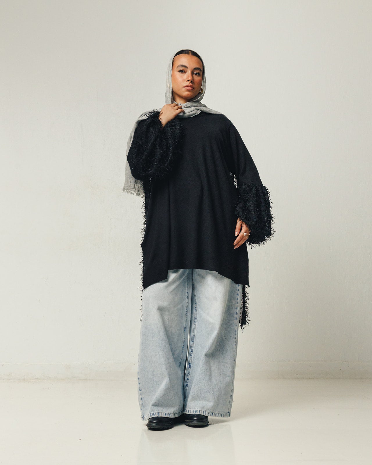 Feathers Knit Puffy Sleeves High Low Top