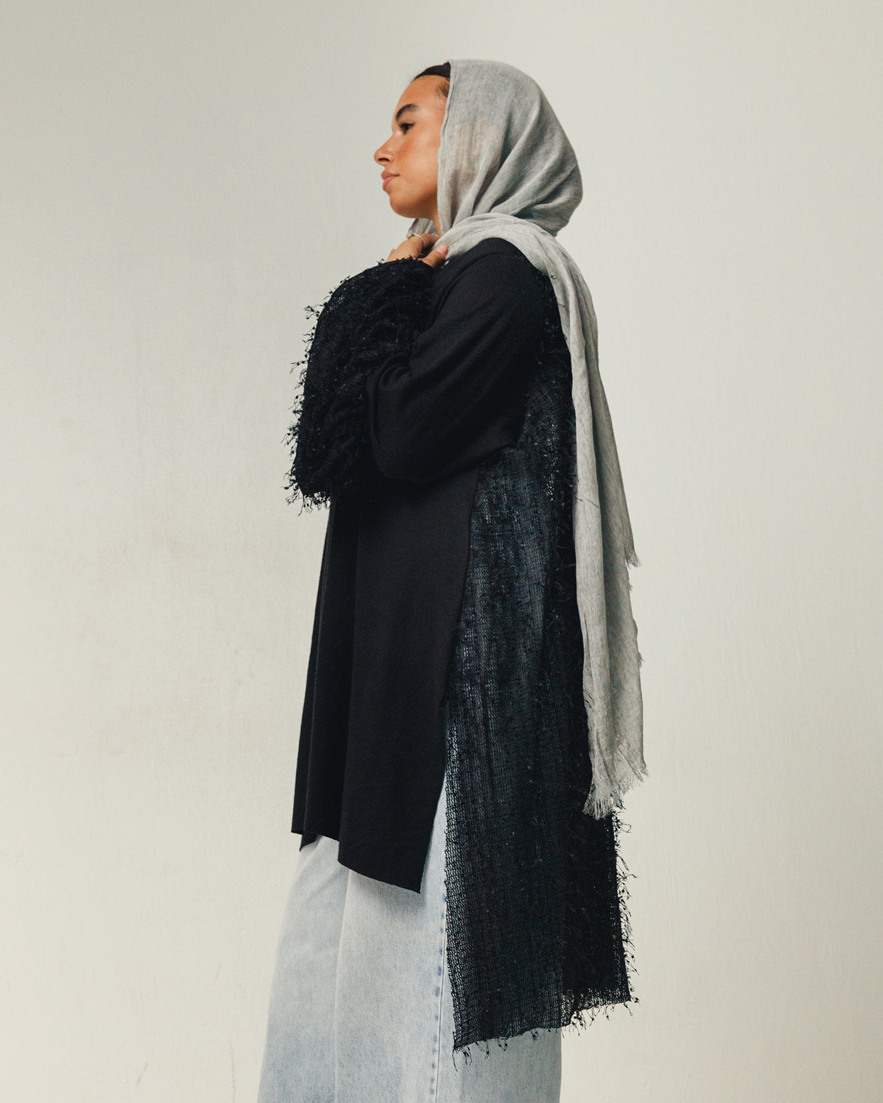 Feathers Knit Puffy Sleeves High Low Top